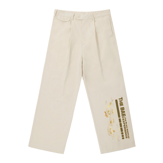BAE Cotton Pants,Straight Leg Streetwear Pants,Unisex Mid Waist Trousers,The BAE Collection,TOTB EATS Apparel,Floral Graphic Pants,Cream Wide Leg Pants,Cultural Streetwear Bottoms,Office to Street Fit,Soft Heritage Streetwear